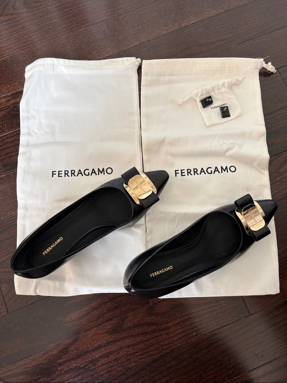 Salvatore Ferragamo Black Leather Vara Bow Flats with Gold Plaque women's 7 1/2